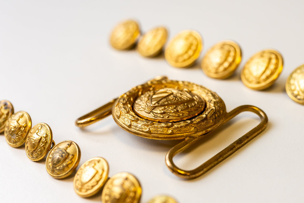 Fidel Castro’s personal uniform buttons and belt buckle