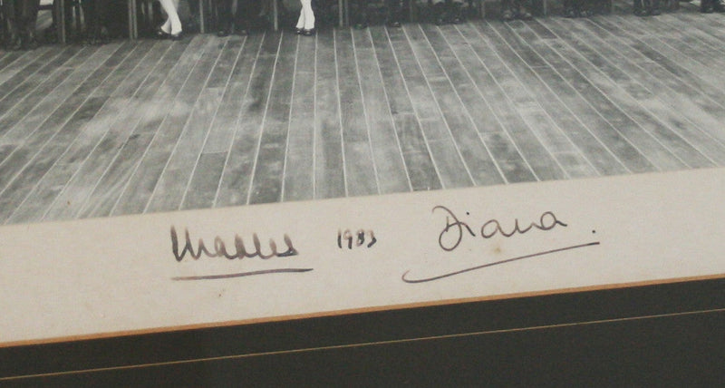 Prince Charles and Princess Diana signed HMS Britannia photo