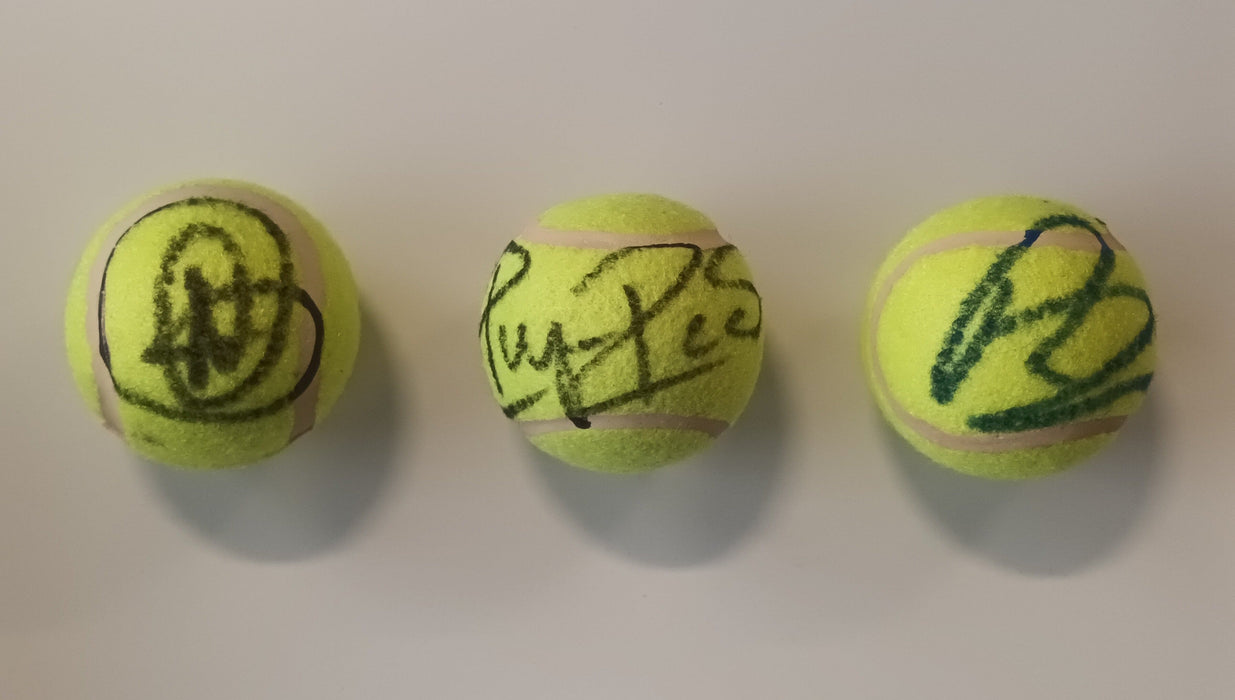 (L-R) Djokovic, Federer and Nadal autographs