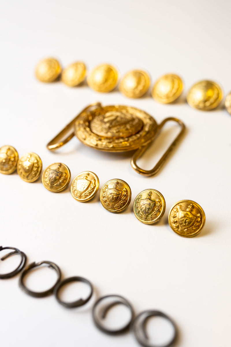 Fidel Castro’s personal uniform buttons and belt buckle