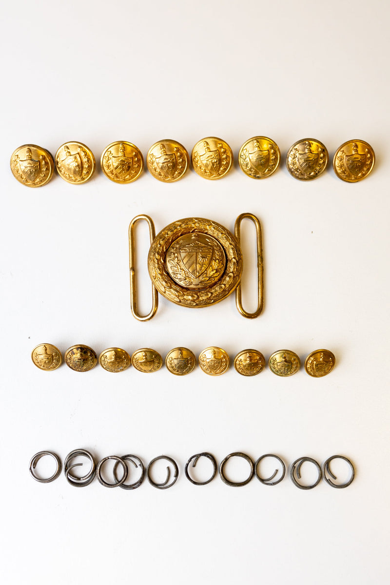 Fidel Castro’s personal uniform buttons and belt buckle