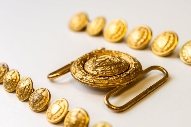 Fidel Castro’s personal uniform buttons and belt buckle