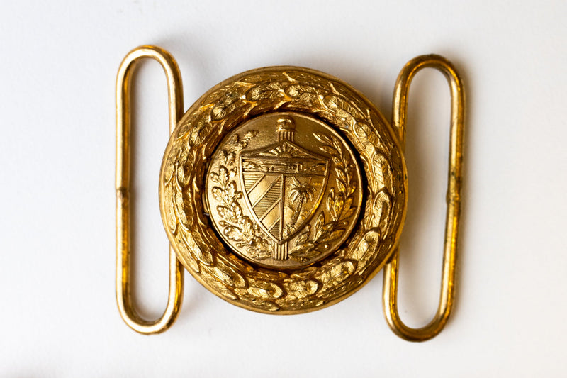 Fidel Castro’s personal uniform buttons and belt buckle