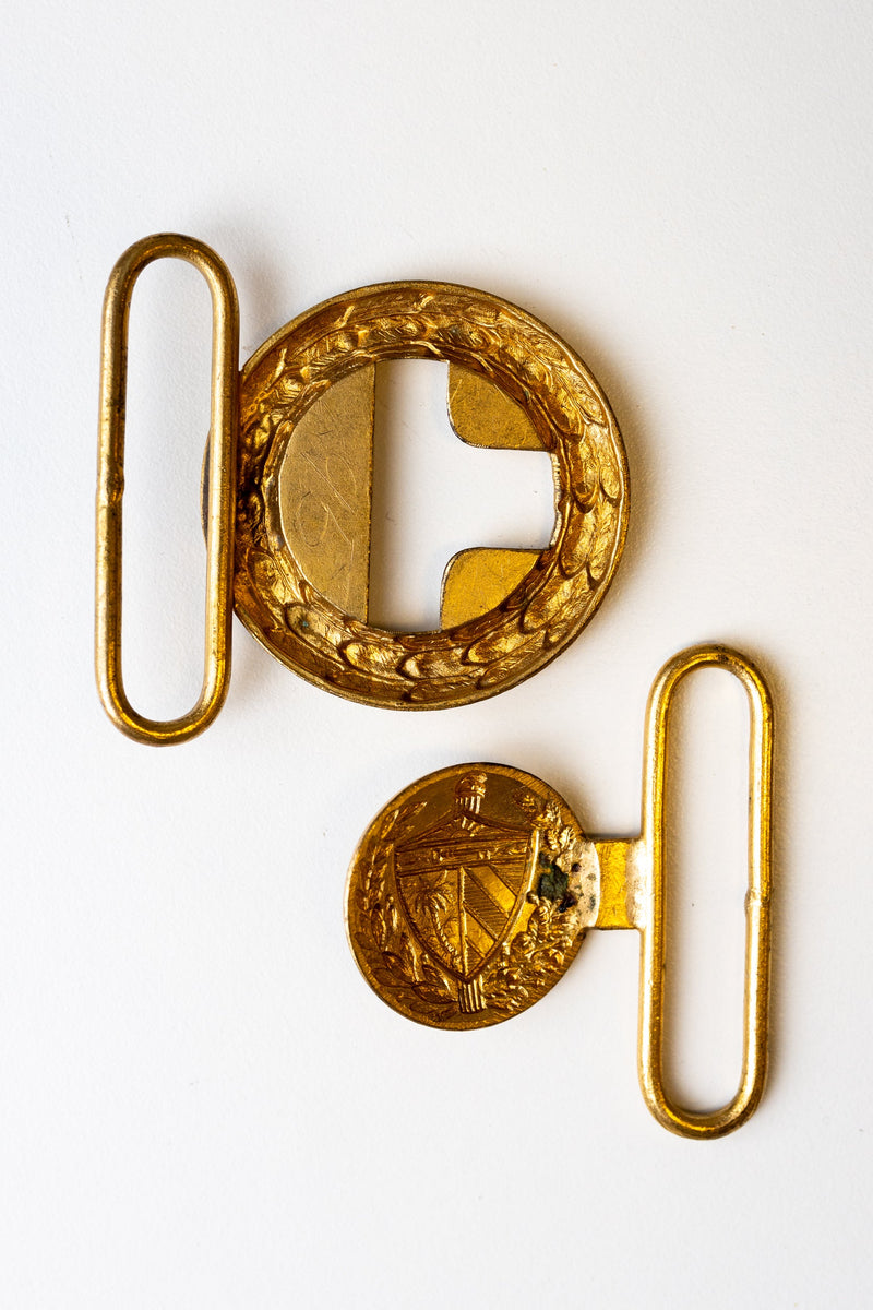 Fidel Castro’s personal uniform buttons and belt buckle