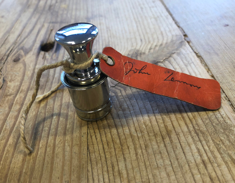 John Lennon’s personal signed Rolls-Royce cigarette lighter