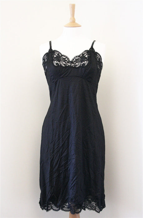 Madonna worn black satin underslip