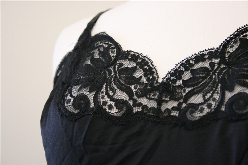 Madonna worn black satin underslip