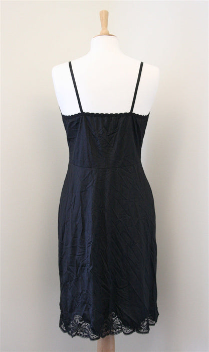 Madonna worn black satin underslip