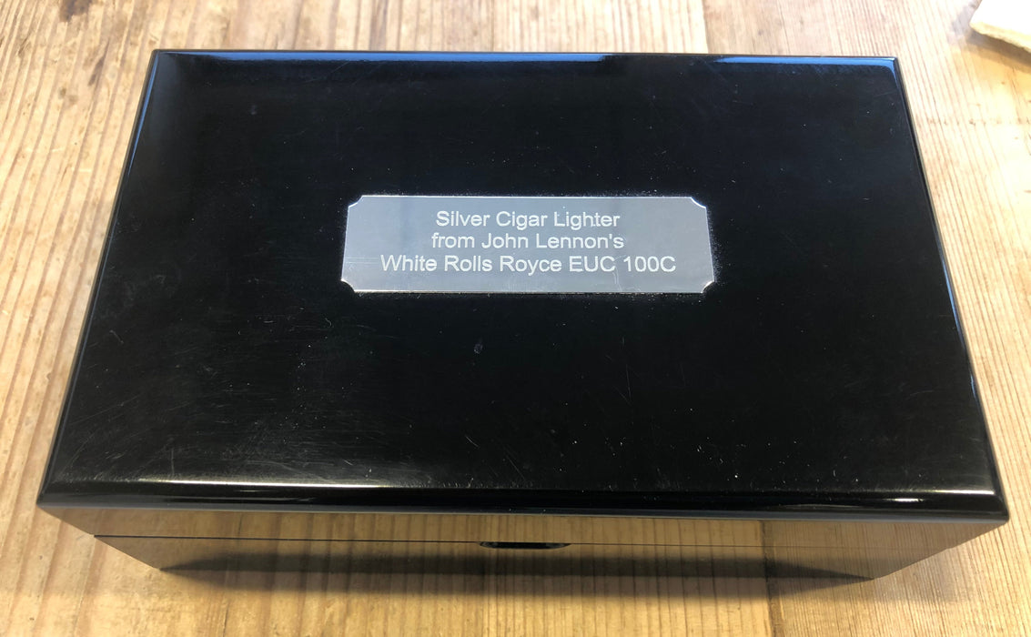 John Lennon’s personal signed Rolls-Royce cigarette lighter